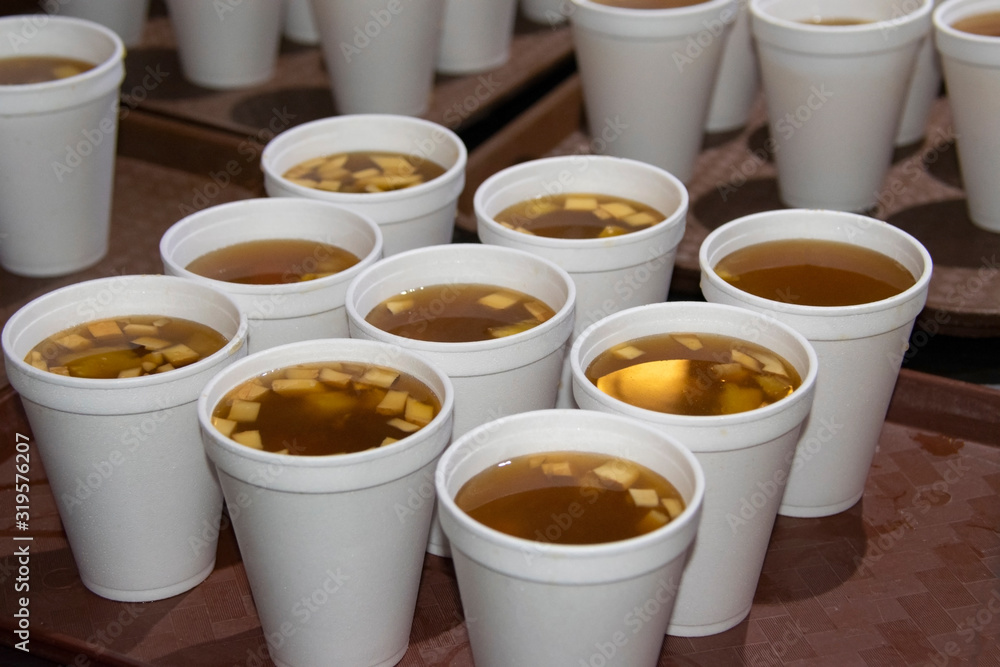 Disposable cup with hot drink made of fruits to celebrate Christmas in Guatemala, called Ponche. Disposable cup with hot drink made of fruits to celebrate Christmas in Guatemala, called Ponche.
