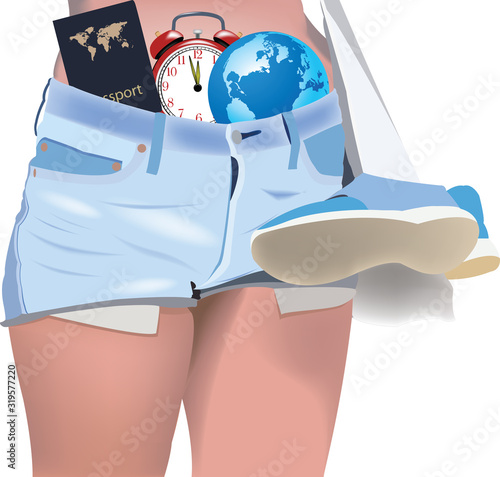 ragazza in jeans corti tenuti dalla spiaggia photo