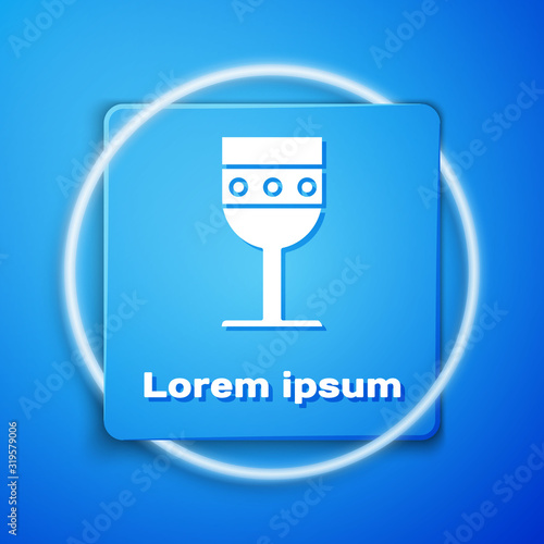 White Medieval goblet icon isolated on blue background. Blue square button. Vector Illustration