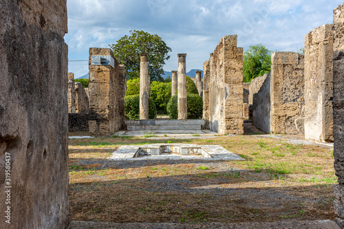 Italy, Pompeii, archaeological area, remains of the city buried by the eruption of ashes and rocks of Vesuvius in 79. Remains of a house with colonnades.