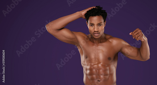 Fit african man with naked torso.
