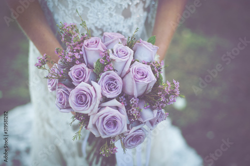 wedding bouquet in hands of bride 