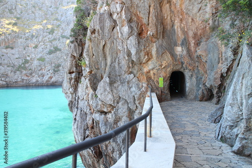 Tunel for pedestrian in bay of Port de Sa Calobra, Mallorca, Spain