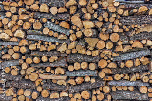 Heap of pieces of almond wood for use in a wood-burning oven for bakers