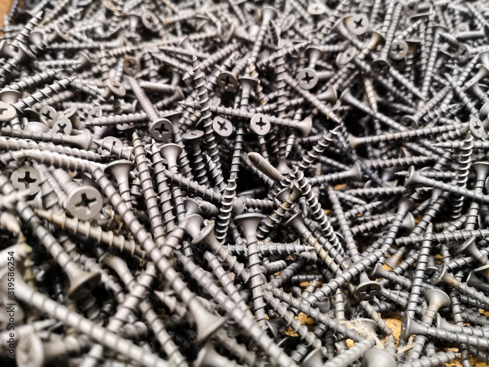 steel self-tapping screws, metal screws, iron screw, screws as background steel self-tapping screws, metal screws, iron screw, screws as background