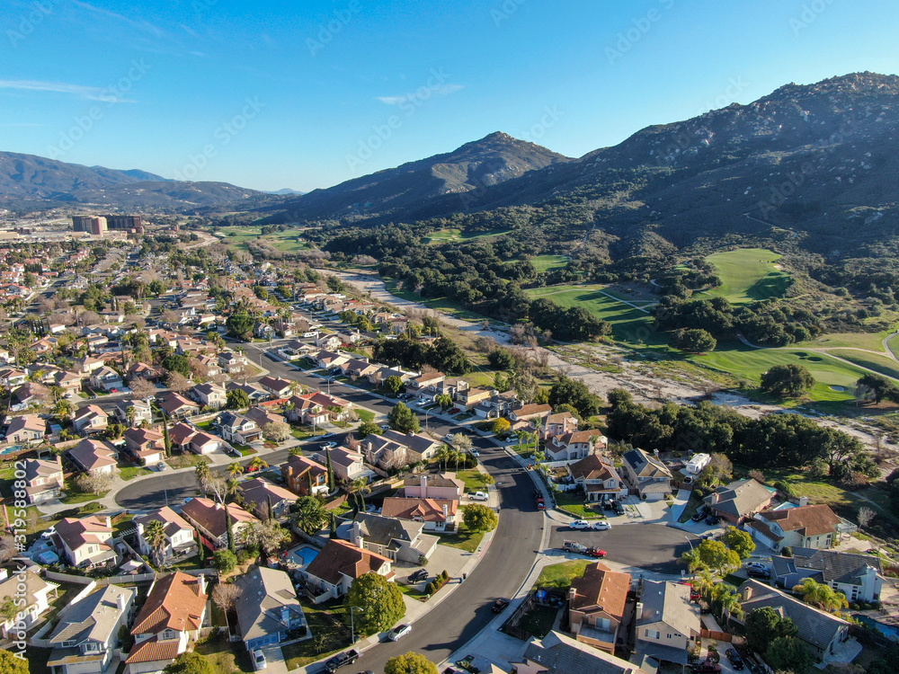 Aerial view of residential town during blue sunny day in Temecula, California, USA.