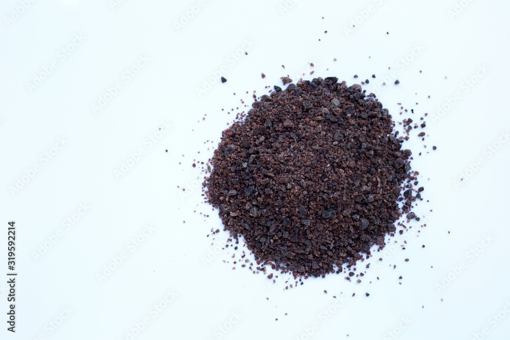 Black himalayan salt on with background. Black himalayan salt on with background.
