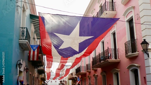Large flag in the streets of Old San Juan 