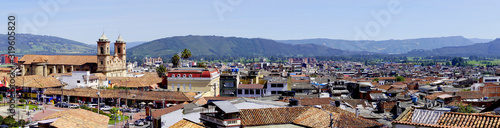 Wallpaper Mural Amazing view of the main town square in Zipaquira, where people visit the church and the local market in the streets with colonial architecture. Torontodigital.ca
