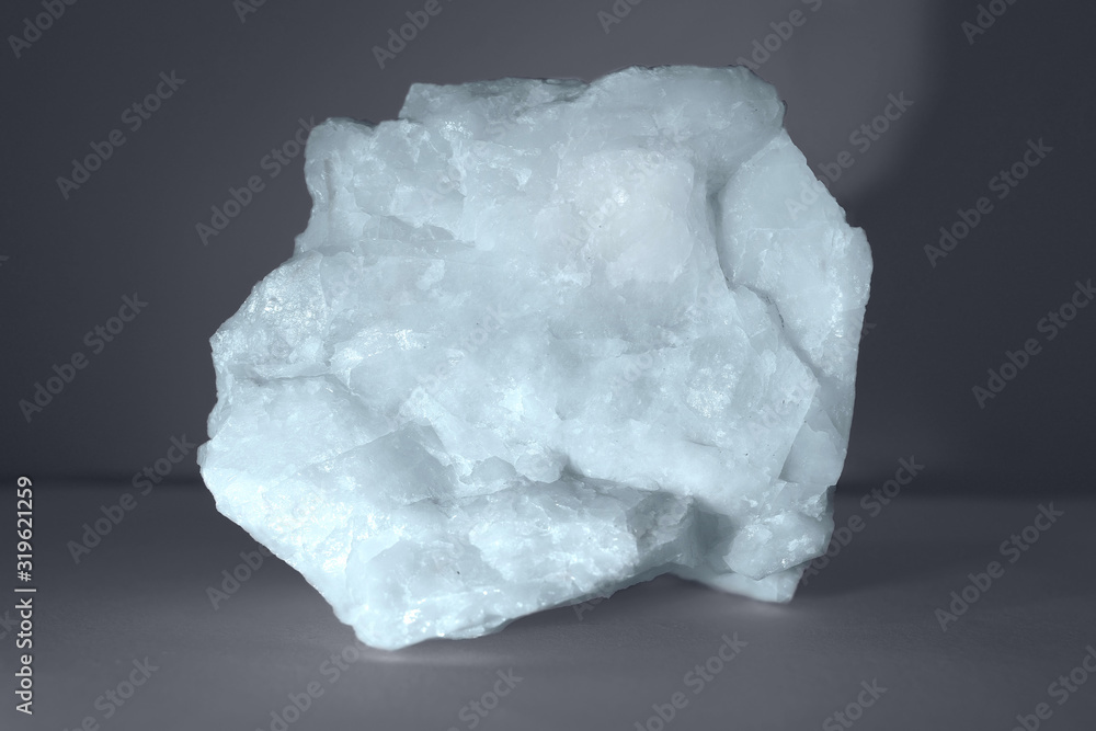 photograph of a piece of dolomite mineral on a dark background photograph of a piece of dolomite mineral on a dark background