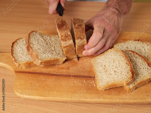 Cutting Bread. Making Fish Frikadeller Series.