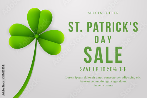 St. Patrick's Day sale background with clover leaves