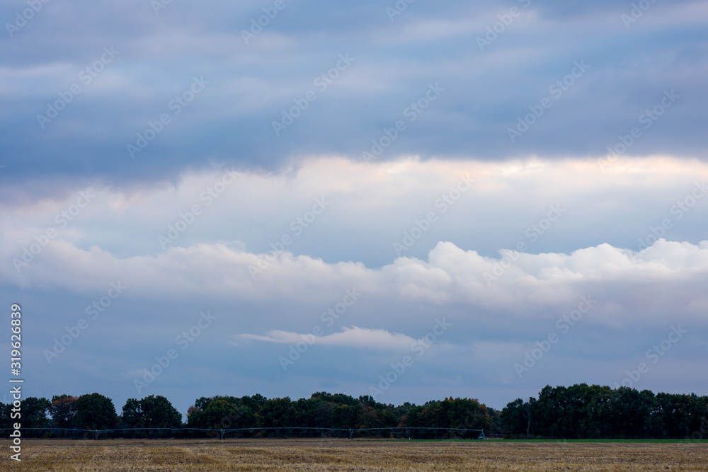 Obraz premium texture of the sky clouds and rays of sun on a background