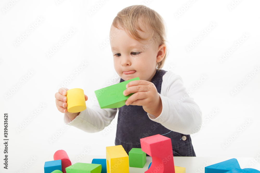 child playing with blocks child playing with blocks