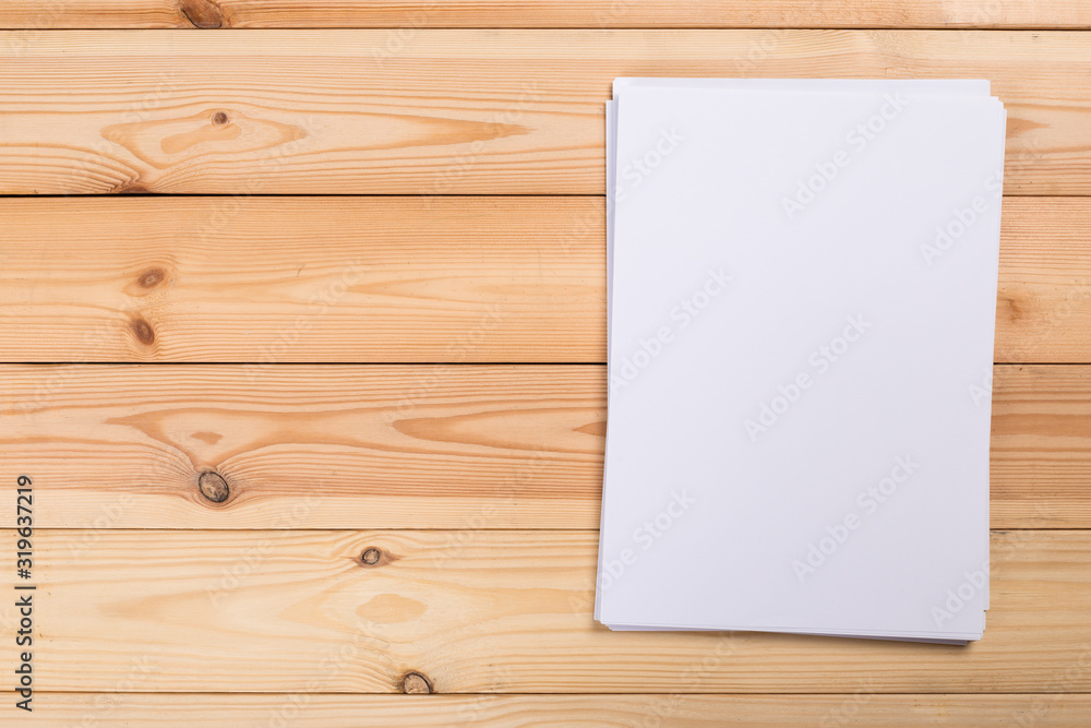 white paper on wood background and shadow white paper on wood background and shadow