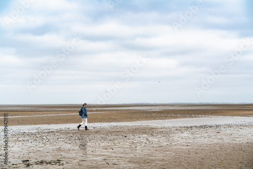WALKING ON THE WADDEN SEA ON SYLT.