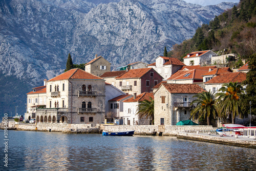 The medieval old European city on the Adriatic. Sea coast. Old stone houses.