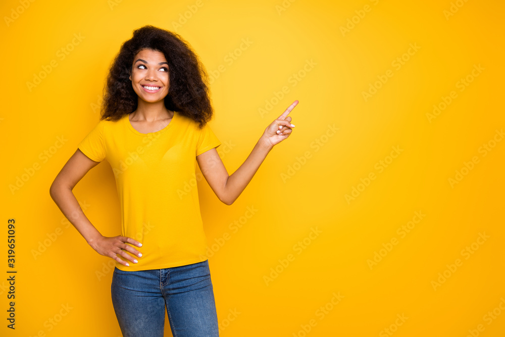 Portrait of her she nice-looking attractive lovely cheerful cheery wavy-haired girl showing indicate index select option isolated over bright vivid shine vibrant yellow color background Portrait of her she nice-looking attractive lovely cheerful cheery wavy-haired girl showing indicate index select option isolated over bright vivid shine vibrant yellow color background