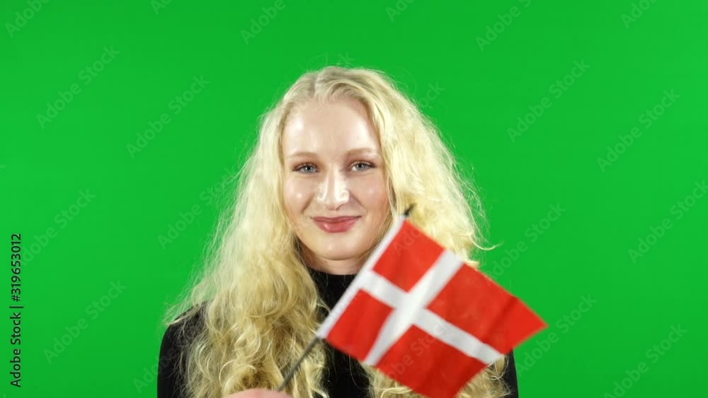 Young Girl waving Denmark hand Flag in front of Green Screen, Chroma Key Background - Danish Stock Video Clip Footage Young Girl waving Denmark hand Flag in front of Green Screen, Chroma Key Background - Danish Stock Video Clip Footage