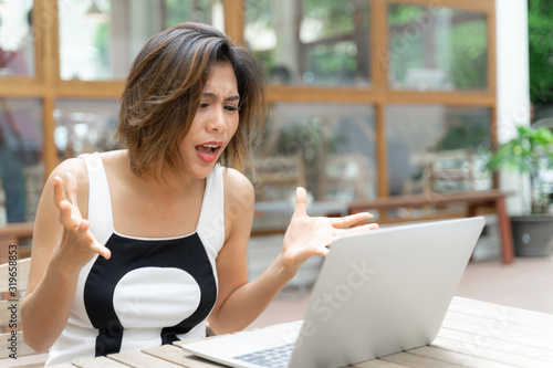 Working woman feeling upset with laptop Free Download Working woman feeling upset with laptop - GFXLoad