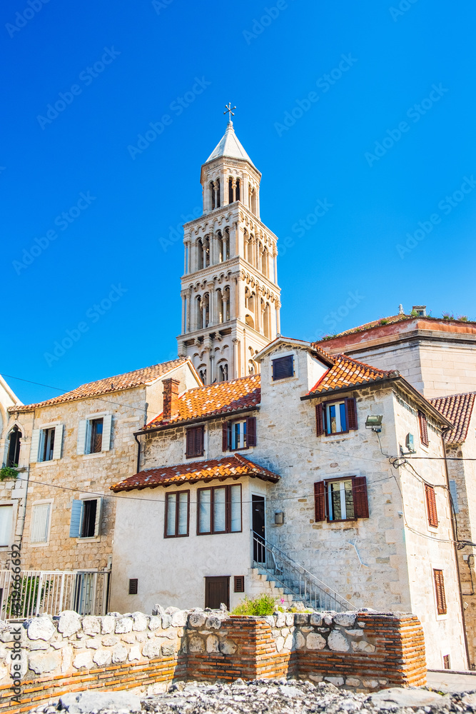 Croatia, city of Split, UNESCO World Heritage Site. Old houses and tower of cathedral in ruins of Roman emperor Diocletian palace