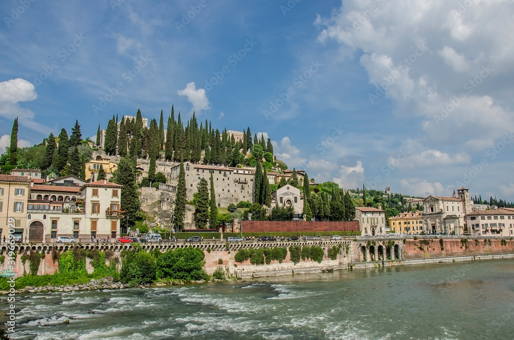 View of the Roman Theater and river in Verona, Italy. View of Roman Theater Archaeological Museum (Museo Archeologico al Teatro Romano) and St. Pietro castle (Castel San Pietro) in Verona. View of the Roman Theater and river in Verona, Italy. View of Roman Theater Archaeological Museum (Museo Archeologico al Teatro Romano) and St. Pietro castle (Castel San Pietro) in Verona.