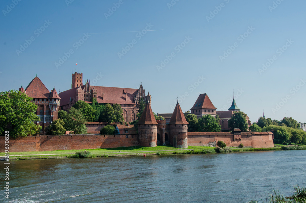 Castle of the Teutonic Order in Malbork, Poland. It is the largest castle in the world. Brick castle.
