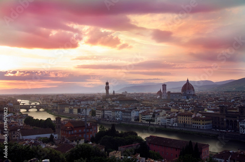 View of Florence after sunset from Piazzale Michelangelo, Florence, Italy. Beautiful panoramic view of Duomo Santa Maria Del Fiore and tower of Palazzo Vecchio during evening.