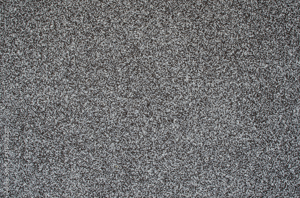 Gray background, wall with black, white and gray grains. Monochrome abstract background. Gray granite texture. Wall background, pattern. Wall decoration. Wall banner, grunge. Gray background, wall with black, white and gray grains. Monochrome abstract background. Gray granite texture. Wall background, pattern. Wall decoration. Wall banner, grunge.