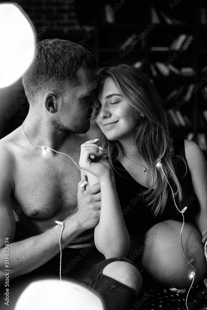 Happy man touching belly of smiling pregnant woman Happy man touching belly of smiling pregnant woman
