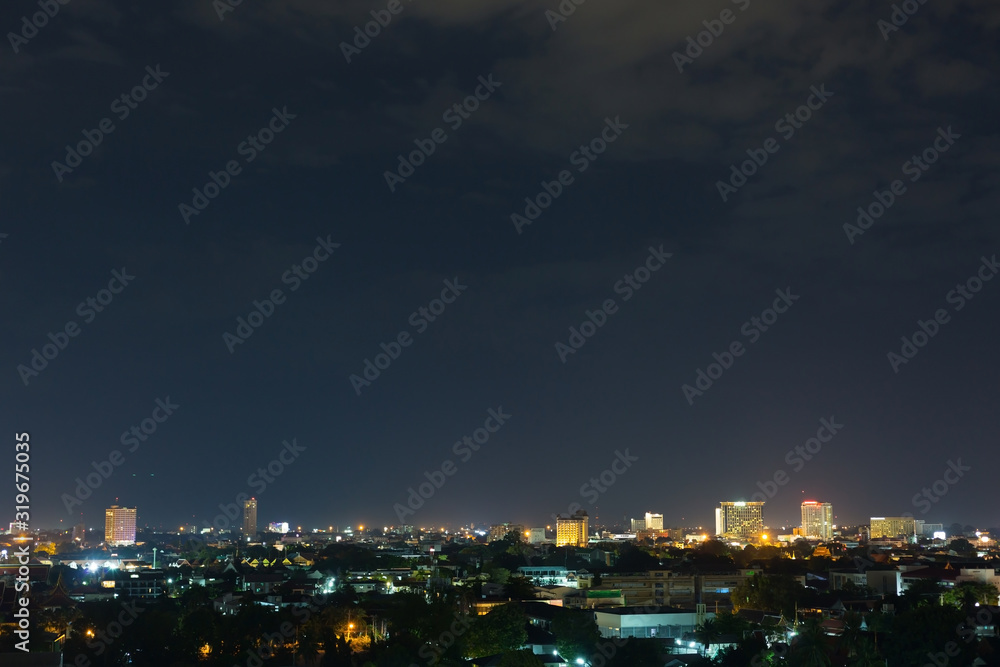 landscape city night with dramatic moody dark sky