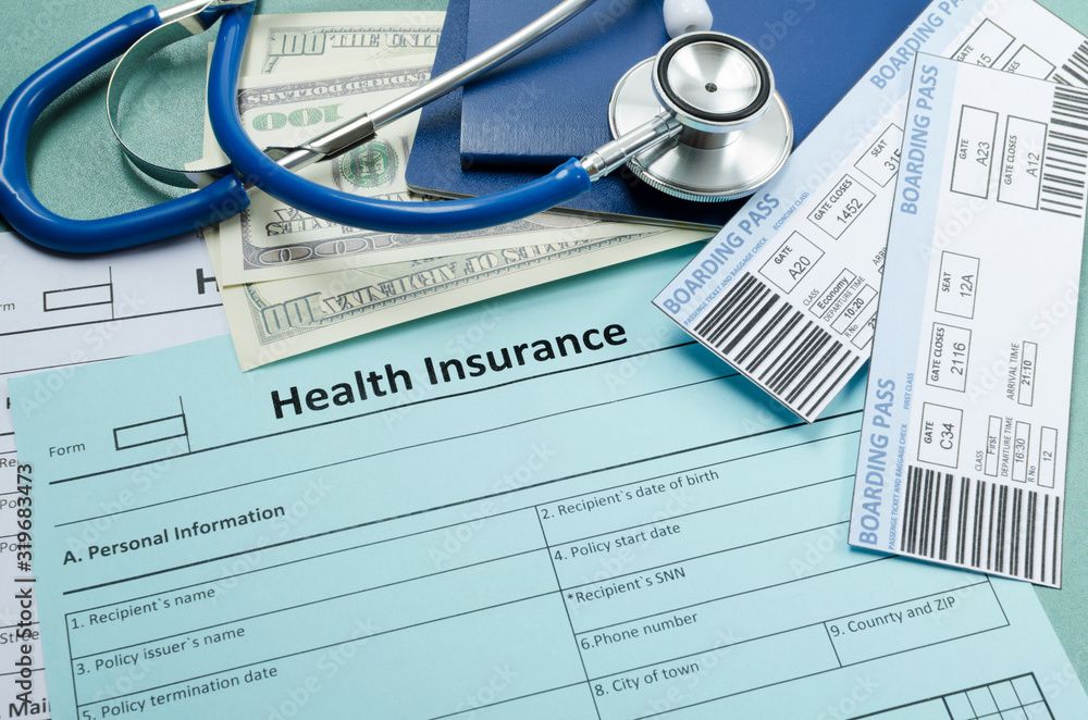 Blank insurance police form, stethoscope, money, iarplane tickets and  passport on the table.Concept of safe journey Stock Photo | Adobe Stock