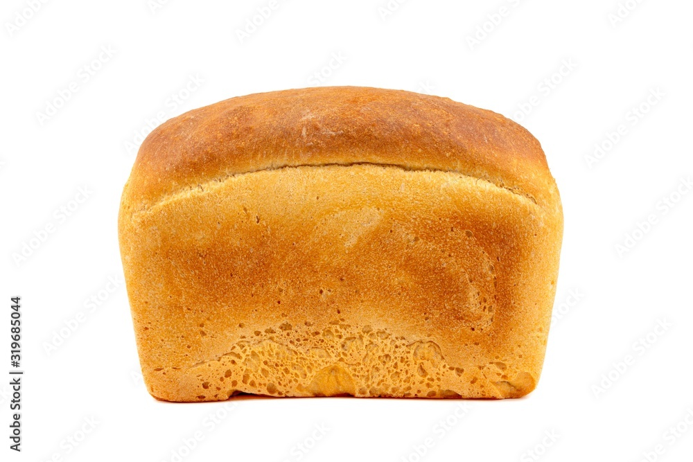 A whole loaf of white bread isolated on a white background close up side view A whole loaf of white bread isolated on a white background close up side view