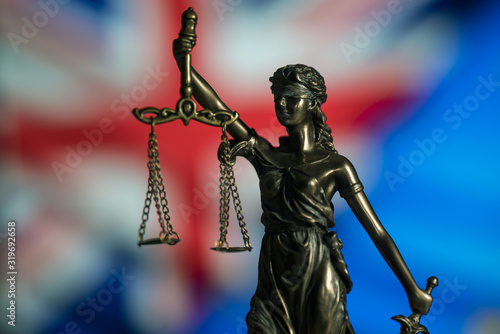 Law and Justice concept. UE and GB flag background, place for typography. Courtroom brexit theme.