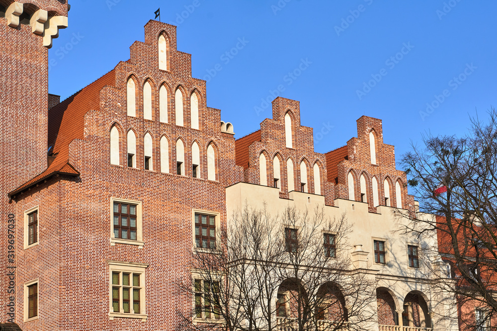 The historic brick building reconstructed royal castle in autumn in Poznan.. The historic brick building reconstructed royal castle in autumn in Poznan..