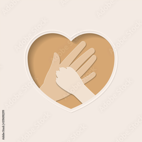 Big hand of human holding paw of dog, in brown heart shaped frame paper art greeting card