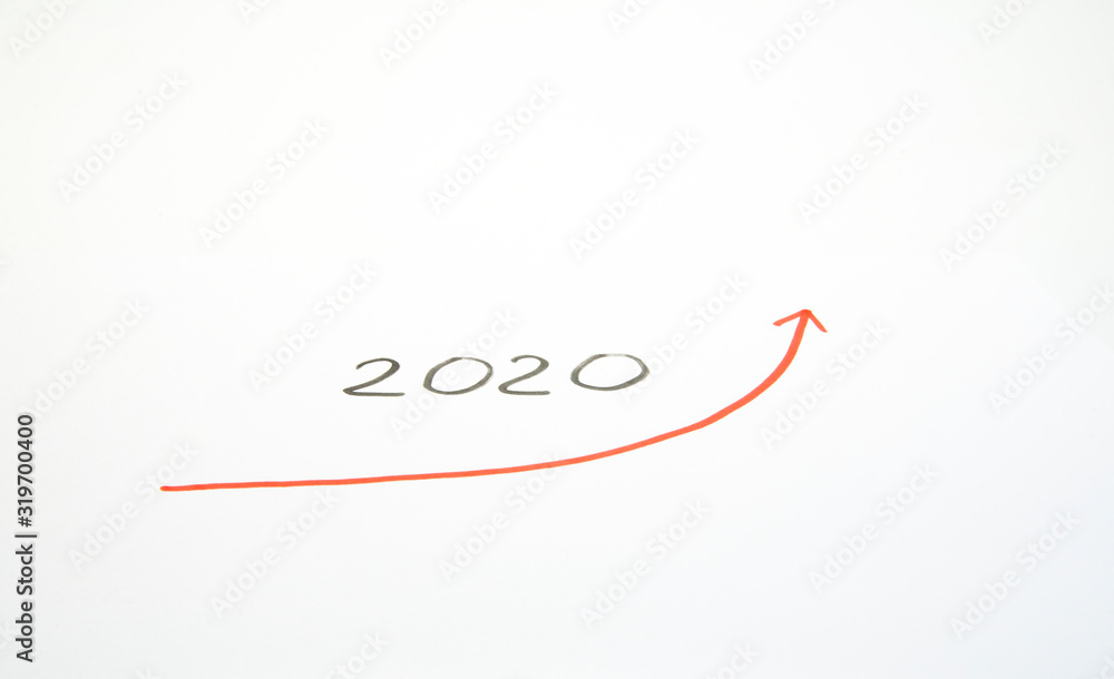 The graph of economic growth in 2020. The concept of success. On a white sheet. The graph of economic growth in 2020. The concept of success. On a white sheet.