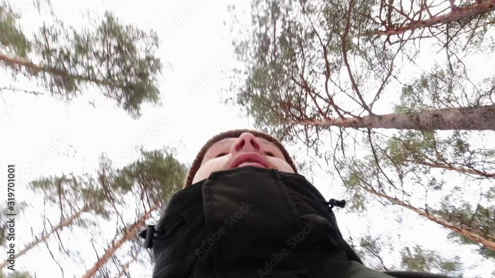 A young man running through the woods from pursuers. Fear, loss, lost, chase. A young man running through the woods from pursuers. Fear, loss, lost, chase.