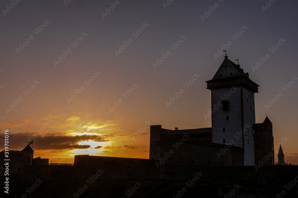 Dramatic beautiful sunrise over a medieval castle