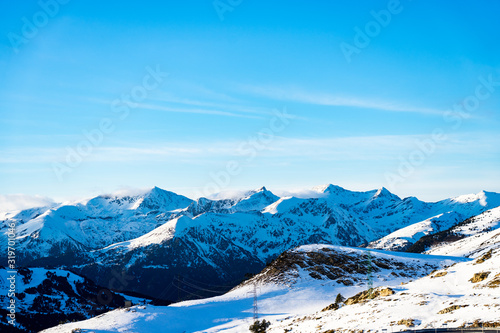 Wallpaper Mural Montañas con nieve en andorra y cielo azul despejado Torontodigital.ca