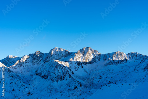 Wallpaper Mural Montañas con nieve en andorra y cielo azul despejado Torontodigital.ca
