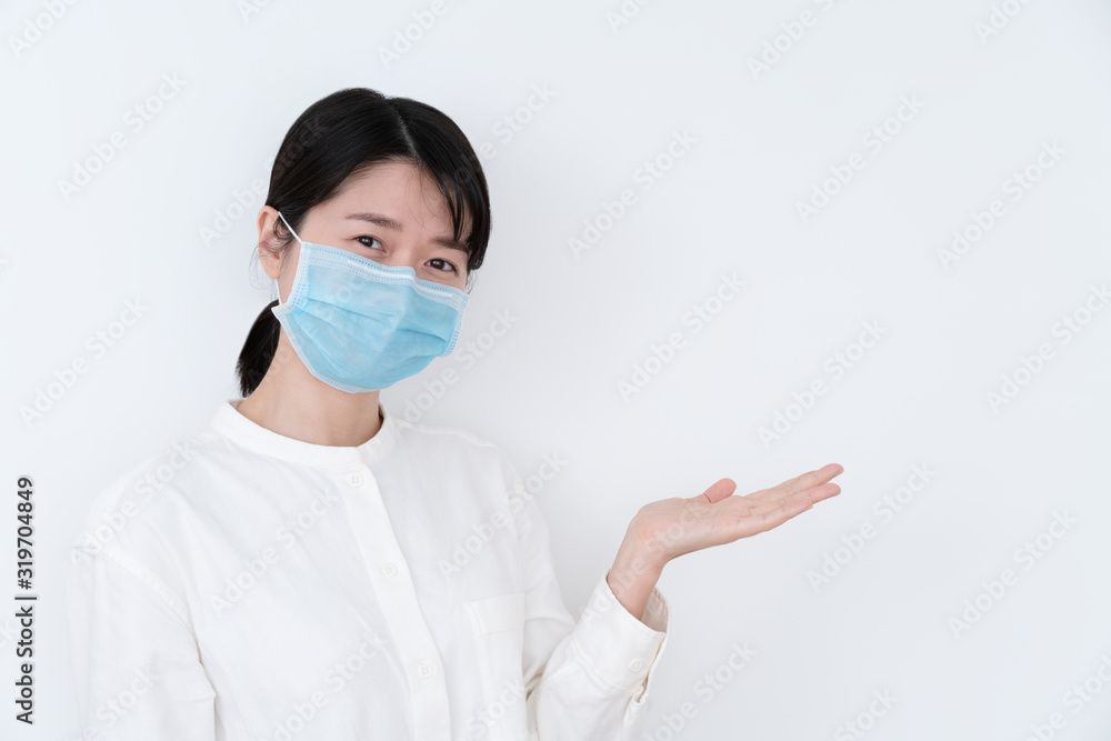 Asian woman wearing a protective mask Asian woman wearing a protective mask