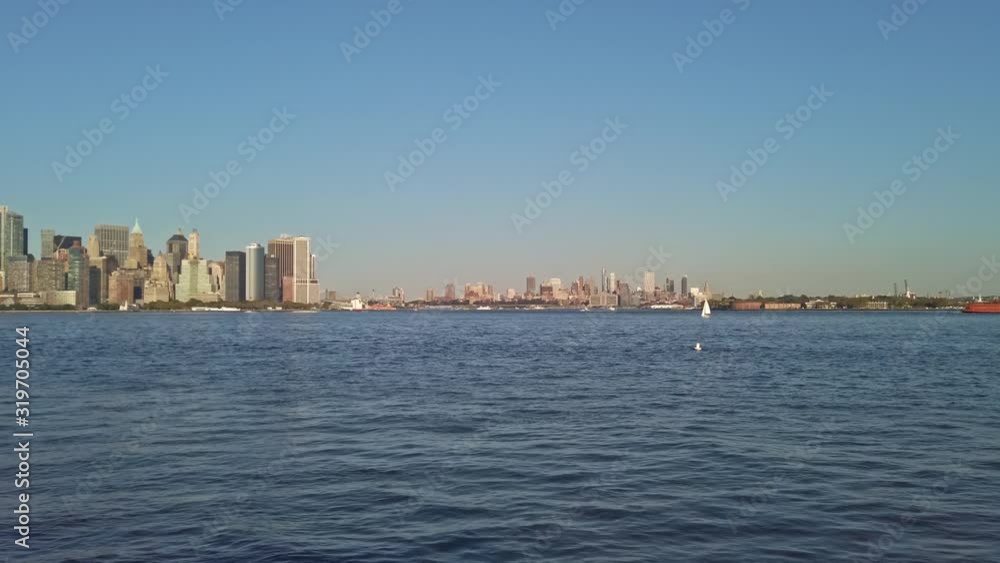 New York city, Hudson river and a floating touristic boat New York city, Hudson river and a floating touristic boat