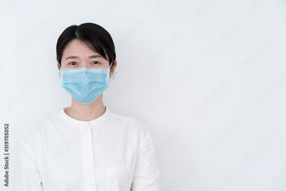Asian woman wearing a protective mask Asian woman wearing a protective mask