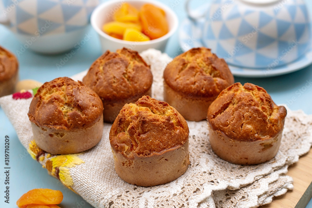 Homemade sweet muffins with dried apricots Homemade sweet muffins with dried apricots