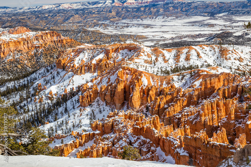 View of Bryce Canyon mountains during winter covered with snow seen from Inspiration Point
