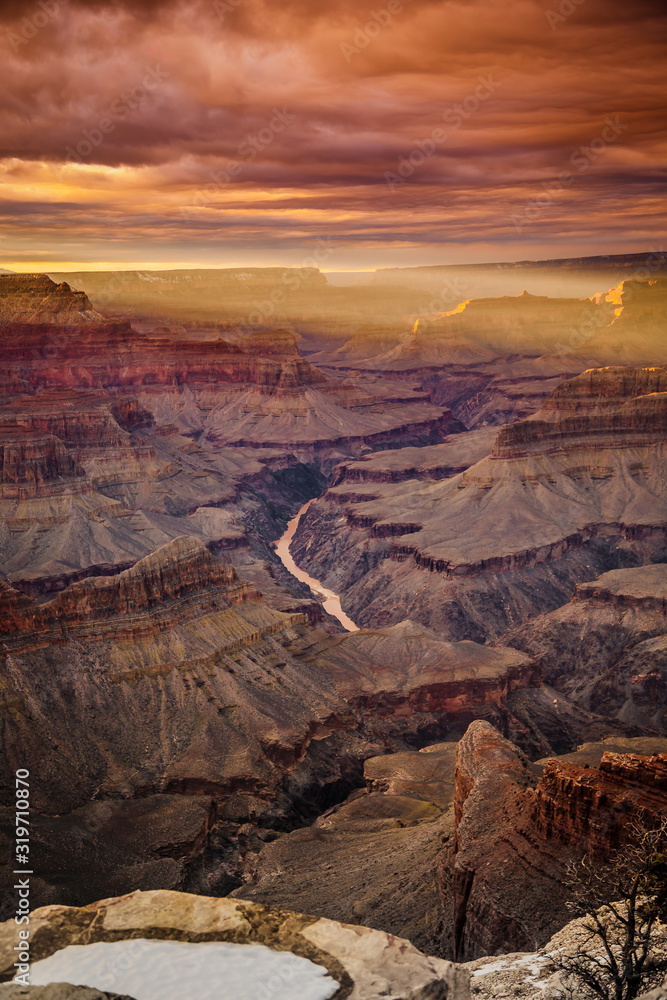Dramatic sunset on the Grand Canyon during winter 