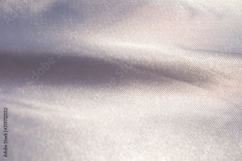 streak of silver fabric abstract background