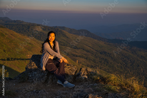 Traveller woman on Phu Lanka mountain forest park in Phayao province, Thailand.