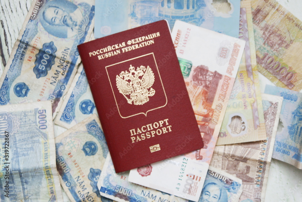 the foreign passport of the Russian Federation is placed on Vietnamese banknotes and rubles the foreign passport of the Russian Federation is placed on Vietnamese banknotes and rubles